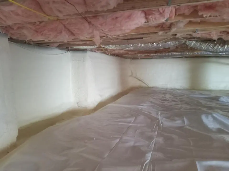 Crawl space encapsulation with closed-cell spray foam for Commercial Roof Restoration in Berlin